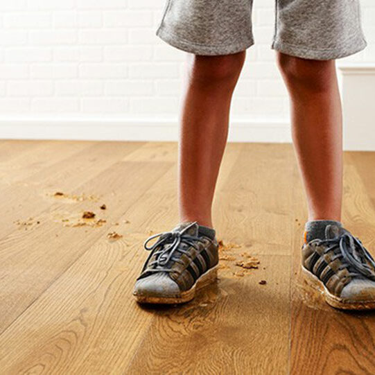 Muddy Shoes on Floor | Randy's Flooring